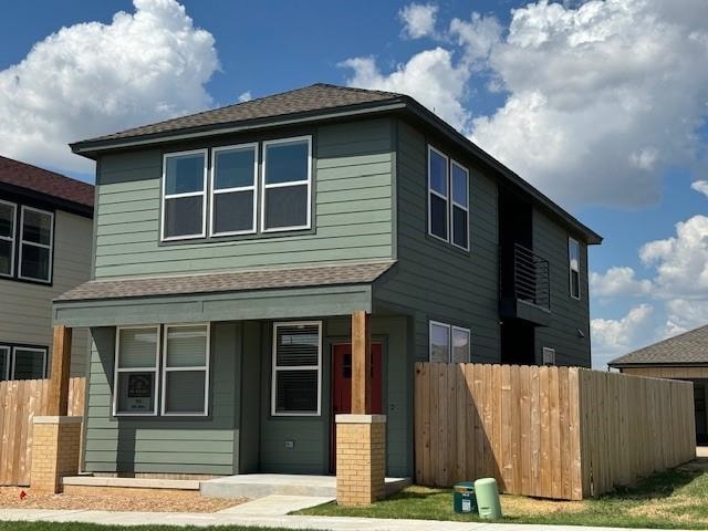 view of front of home featuring a front lawn