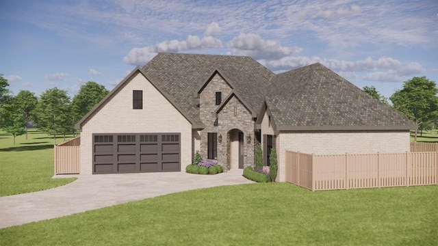 view of front of property featuring a garage and a front lawn