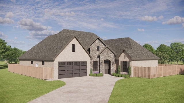 view of front facade with a garage and a front lawn