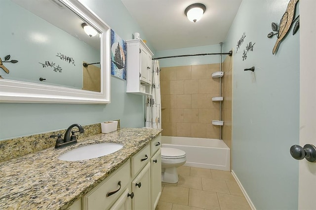 full bathroom featuring tile patterned flooring, vanity, tiled shower / bath combo, and toilet