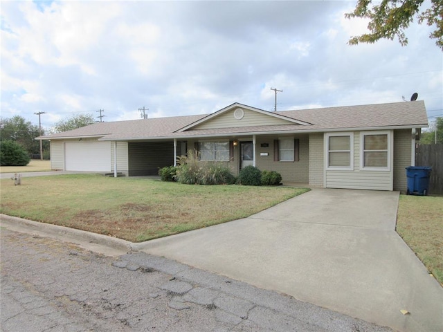 ranch-style home with a garage and a front lawn