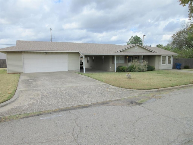 single story home with a front yard and a garage