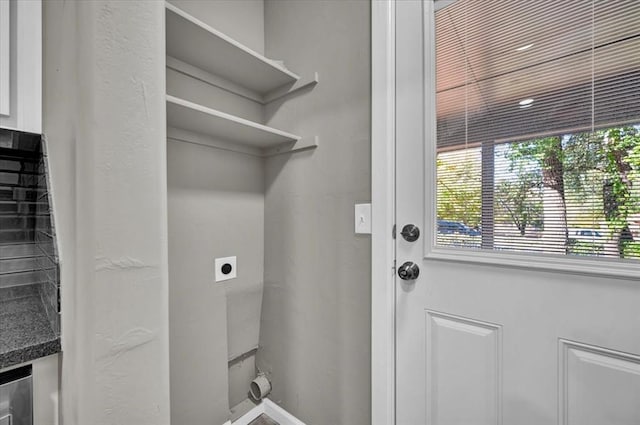 clothes washing area with hookup for an electric dryer