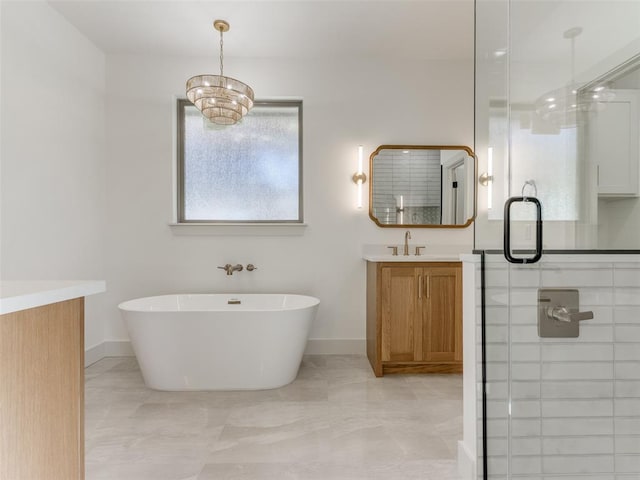 bathroom featuring separate shower and tub and vanity