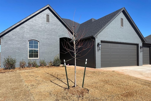 exterior space with a garage