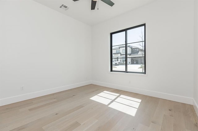 unfurnished room featuring ceiling fan and light hardwood / wood-style floors