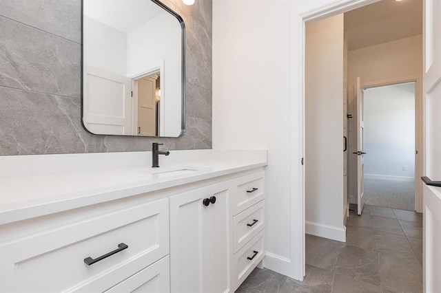 2009 Wiregrass Dr, Edmond, OK 73025 - bathroom featuring vanity and baseboards