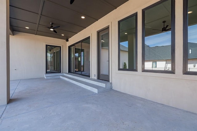 view of patio / terrace featuring ceiling fan