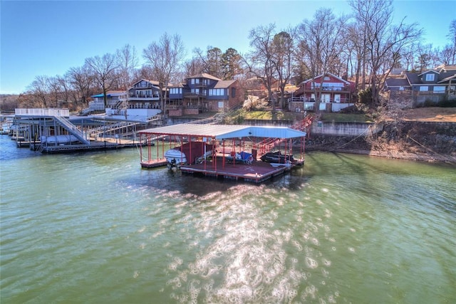 dock area with a water view