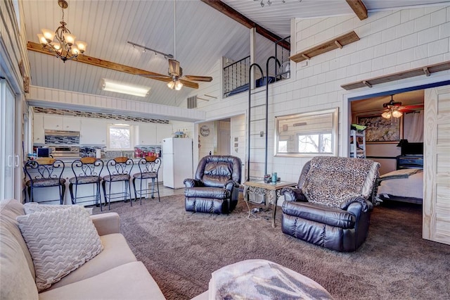 living room with carpet, beam ceiling, ceiling fan with notable chandelier, and high vaulted ceiling