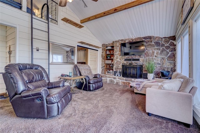 living room featuring high vaulted ceiling, wooden walls, carpet flooring, ceiling fan, and beamed ceiling