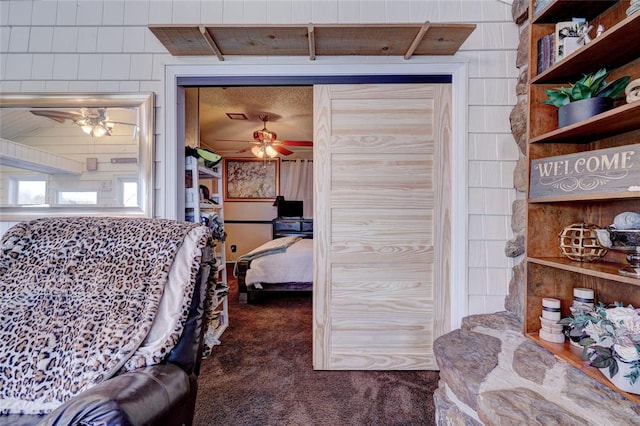 carpeted bedroom with wood ceiling