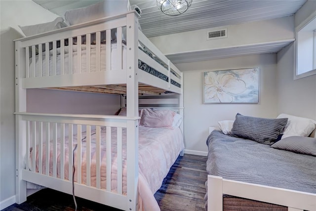 bedroom featuring dark hardwood / wood-style floors