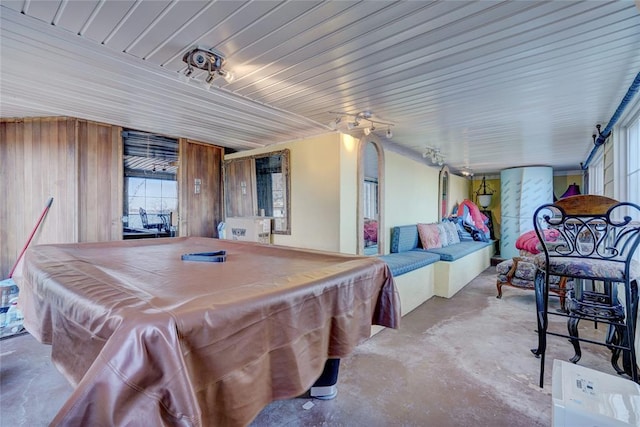 recreation room featuring wood walls and billiards