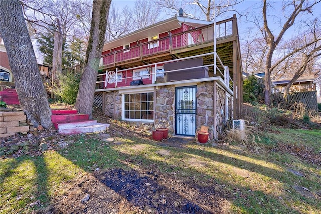 back of house with a balcony