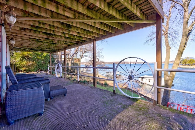 view of patio with a water view