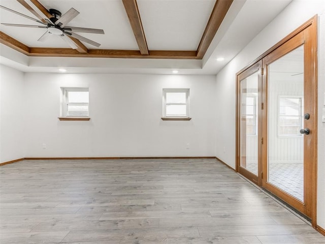 empty room with light hardwood / wood-style floors and ceiling fan