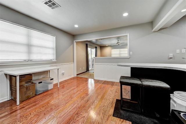 interior space featuring light wood-type flooring and ceiling fan