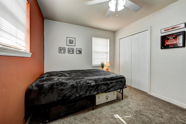 bedroom featuring carpet flooring, a closet, and ceiling fan