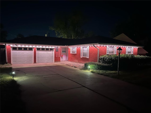 view of front of property with a garage