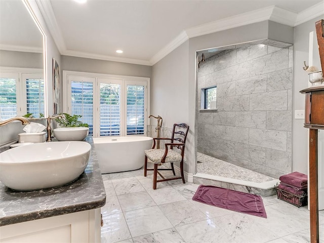 bathroom featuring ornamental molding, vanity, and independent shower and bath