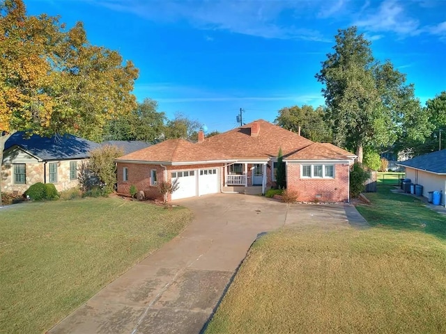 ranch-style home featuring brick siding, a front lawn, driveway, crawl space, and an attached garage