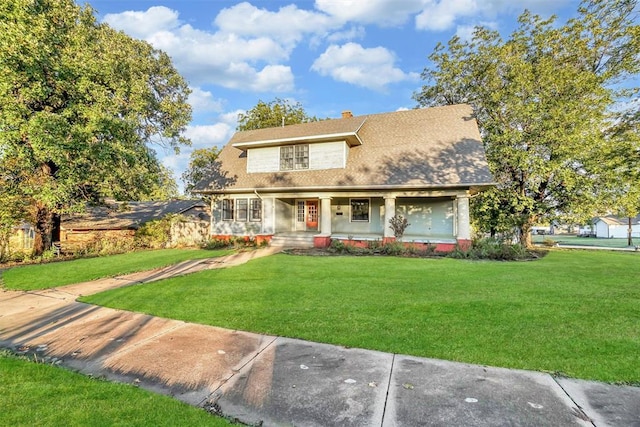603 N College St, Cordell, OK 73632 - view of front of house with covered porch, a front lawn, and a chimney