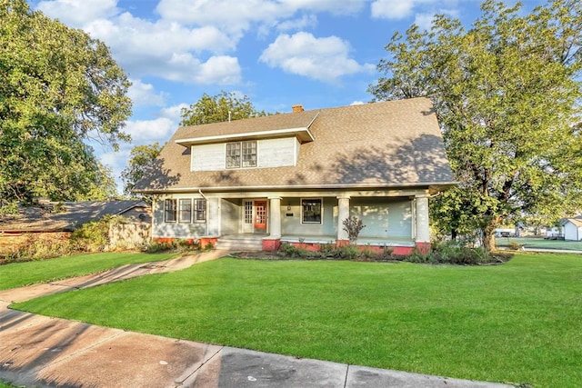 view of front of home featuring a porch and a front yard