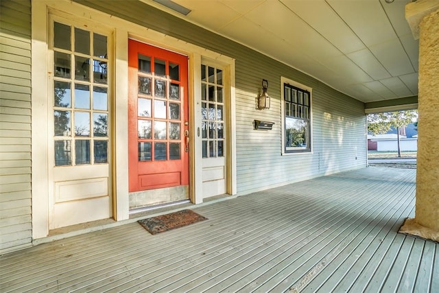 wooden terrace with a porch