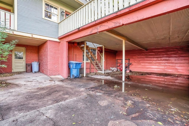 603 N College St, Cordell, OK 73632 - view of patio with stairs and driveway
