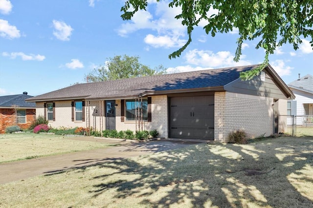 ranch-style home with a front yard and a garage