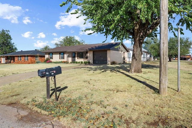 single story home with a front yard