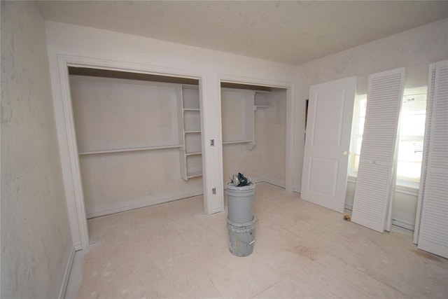 interior space featuring two closets