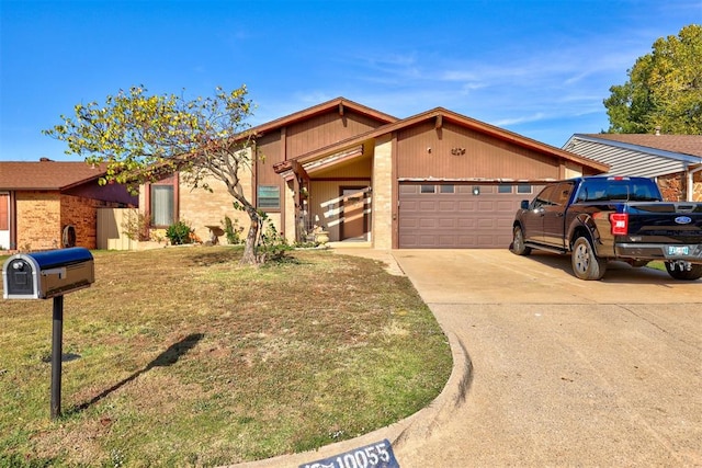 ranch-style house featuring a garage and a front lawn