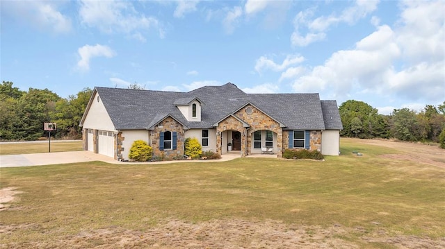 french country inspired facade with a front yard and a garage