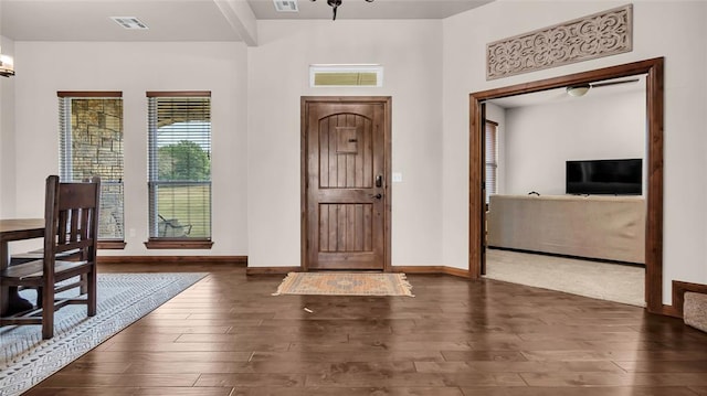 foyer featuring dark wood-type flooring