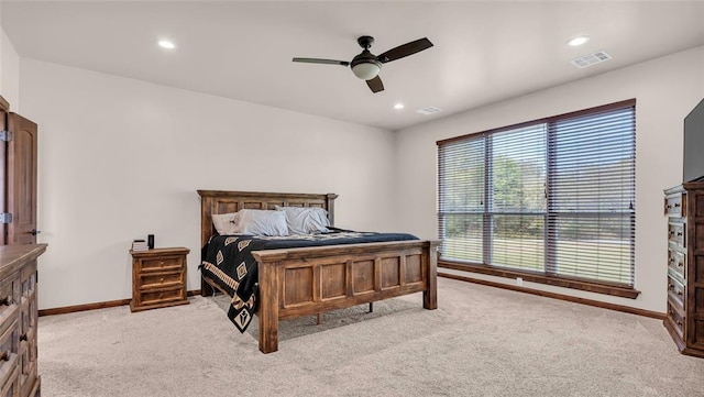 carpeted bedroom featuring ceiling fan