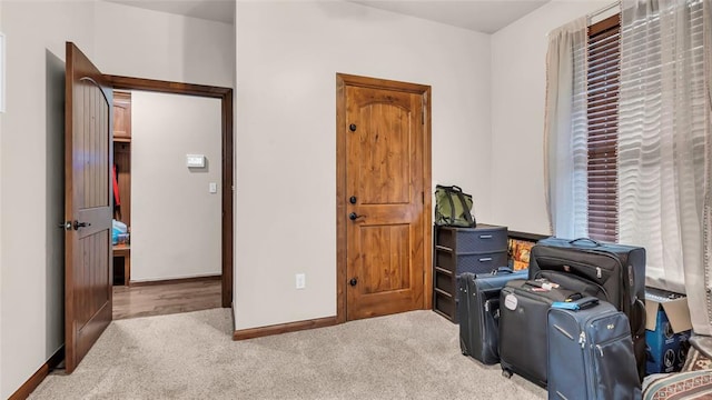 office area featuring light carpet