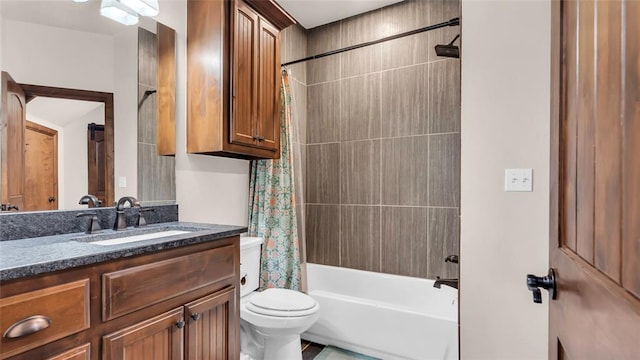 full bathroom featuring shower / tub combo with curtain, vanity, and toilet