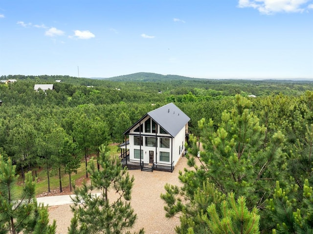 drone / aerial view featuring a mountain view