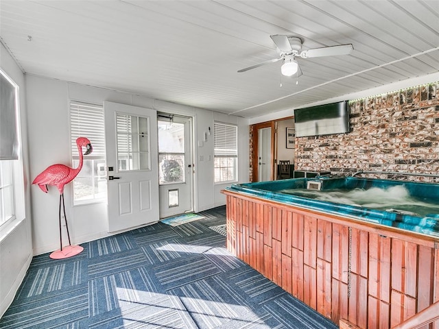 kitchen featuring ceiling fan