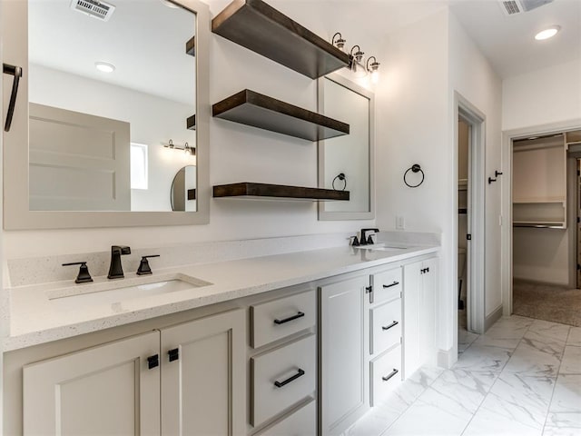 bathroom featuring vanity