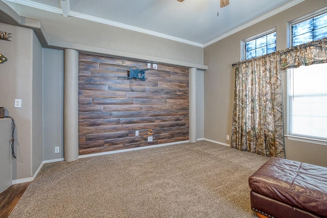 sitting room with ceiling fan, carpet, and ornamental molding