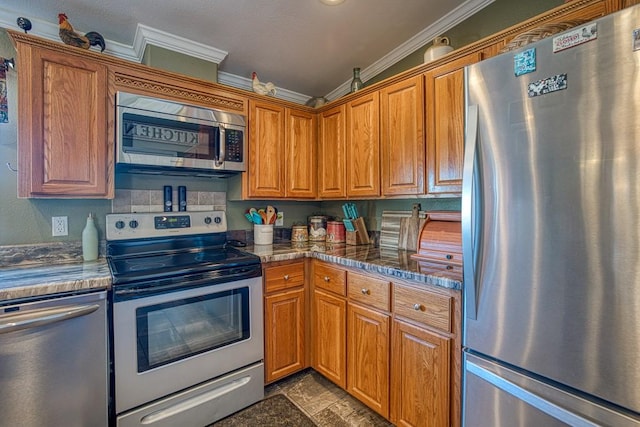 kitchen featuring crown molding and appliances with stainless steel finishes