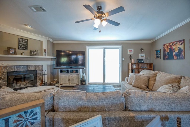 living room with crown molding and ceiling fan