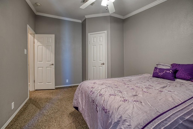 carpeted bedroom featuring ceiling fan and crown molding