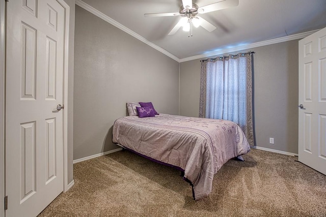 bedroom featuring ceiling fan, carpet floors, and ornamental molding