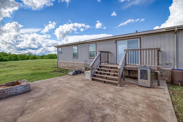23880 State Highway 33, Kingfisher, OK 73750 - rear view of property featuring a patio area, a yard, and a fire pit