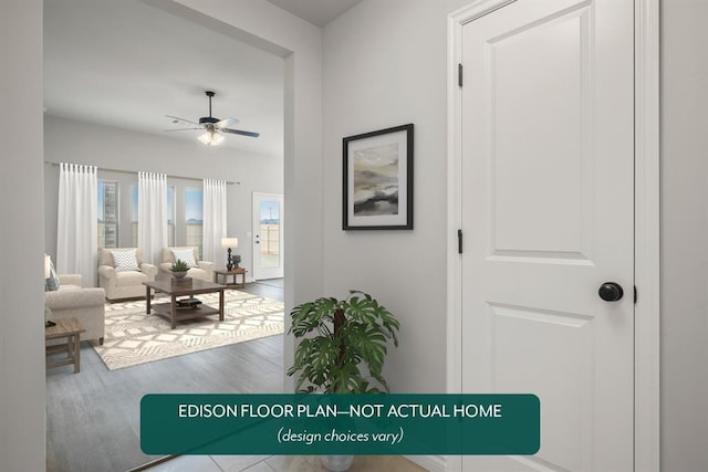 interior space with ceiling fan and hardwood / wood-style flooring