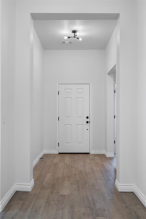 foyer with light hardwood / wood-style floors